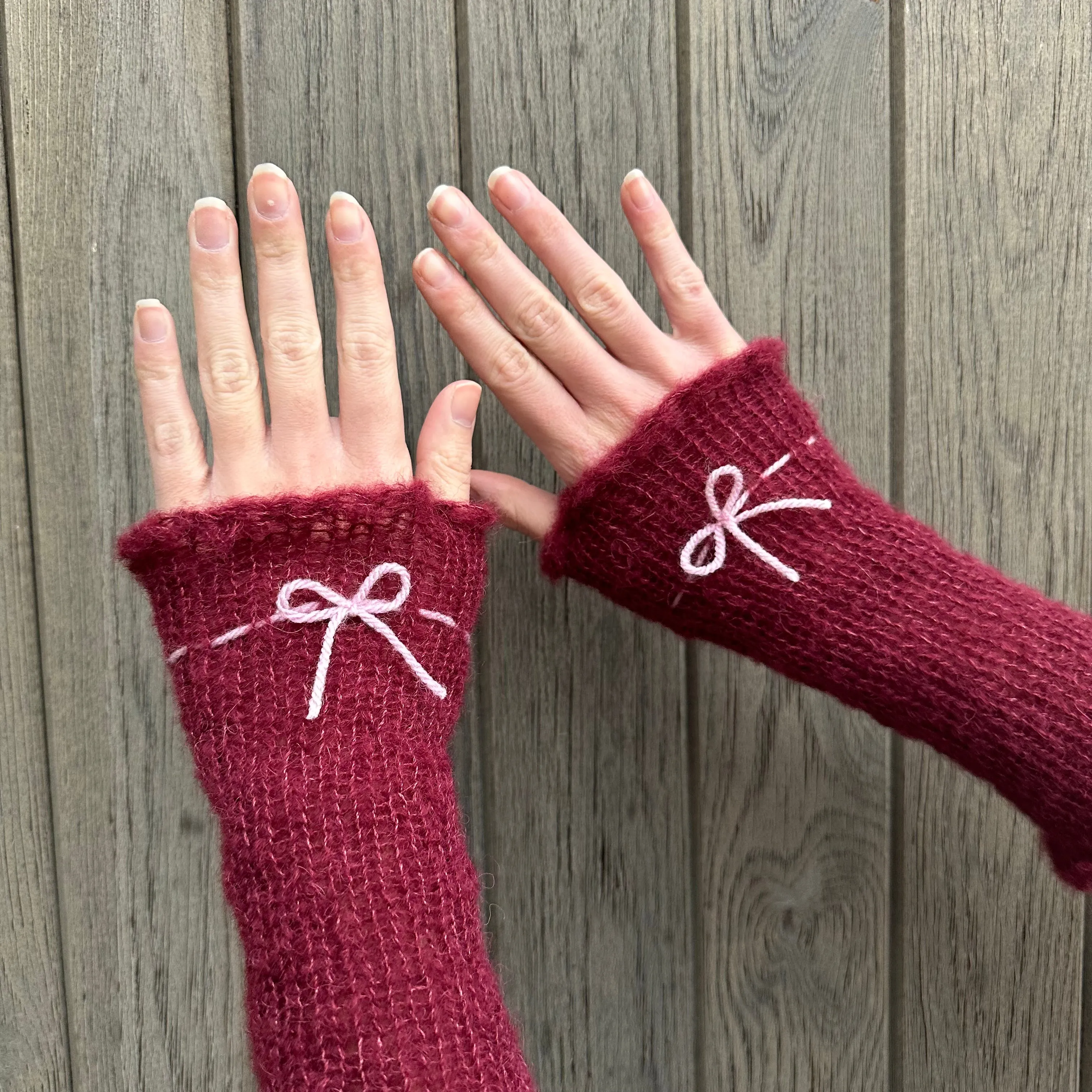 Handmade knitted mohair bow gloves in burgundy and baby pink - with thumb hole