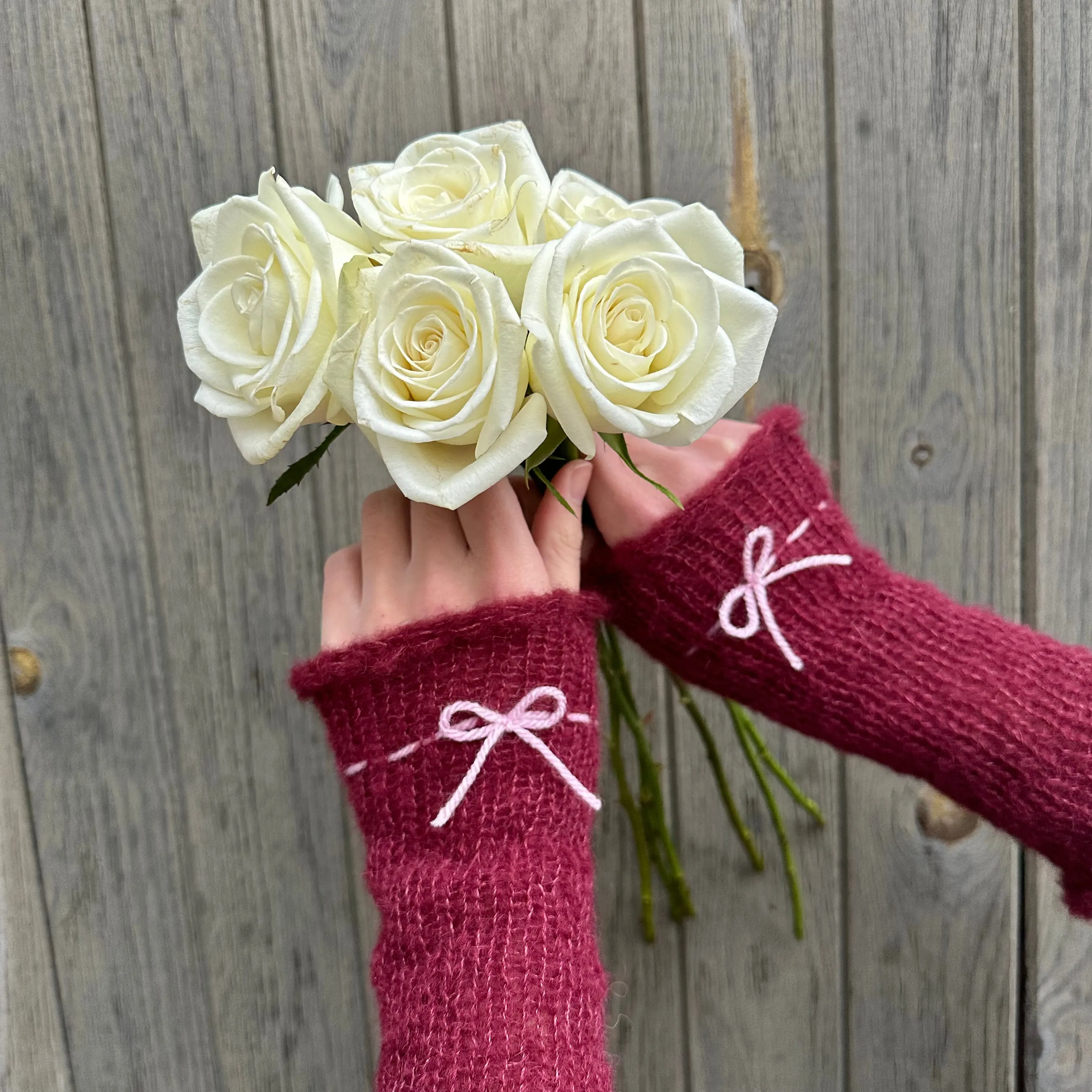 Handmade knitted mohair bow gloves in burgundy and baby pink - with thumb hole