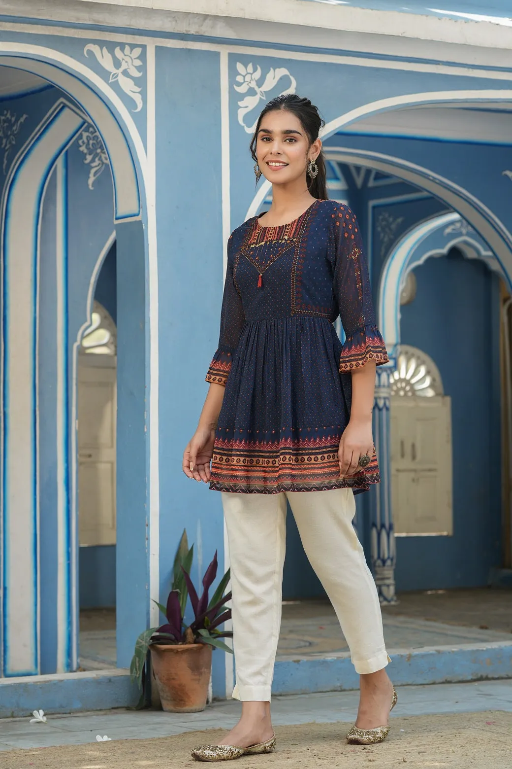 Jashvi Indigo Geometric Printed Georgette Peplum Tunic With Tassels